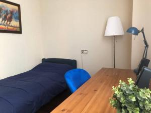 Postel nebo postele na pokoji v ubytování Villa de Madrid 17