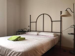 Postel nebo postele na pokoji v ubytování Villa de Madrid 17