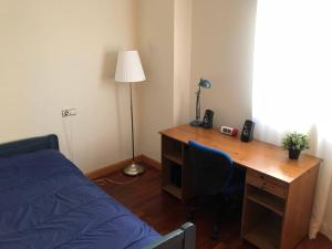 Postel nebo postele na pokoji v ubytování Villa de Madrid 17