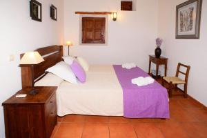 A bed or beds in a room at Can Vich