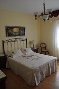 Łóżko lub łóżka w pokoju w obiekcie CASA AUREA DE CACHEIRAS