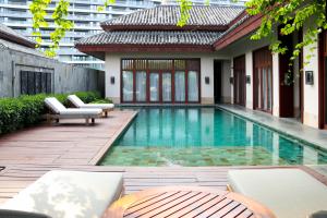 Bazén v ubytování Sanya LUHUITOU Resort & Spa nebo v jeho okolí
