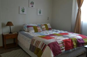 Cama o camas de una habitación en Aparments R&G Puerto Montt
