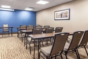 a conference room with tables and chairs in it at Comfort Suites Knoxville Airport in Alcoa