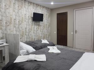 Ένα ή περισσότερα κρεβάτια σε δωμάτιο στο Villa A Barleon Bakuriani