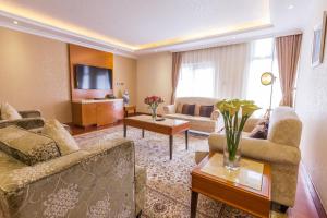 TV a/nebo společenská místnost v ubytování Alba Hotel Meru