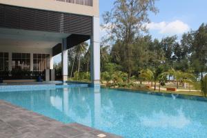 Bazén v ubytování AMERALD RESORT HOTEL DESARU nebo v jeho okolí
