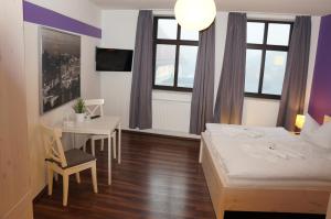 Postel nebo postele na pokoji v ubytování City-Hotel-Wolgast