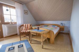 Ein Bett oder Betten in einem Zimmer der Unterkunft Ferienwohnung Müller