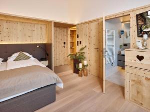 Posteľ alebo postele v izbe v ubytovaní Alpeiner - Nature Resort Tirol