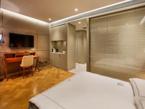 Cama ou camas em um quarto em Fer Hotel