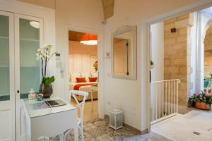A bed or beds in a room at Amatè Suite