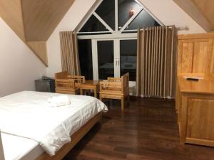 Postel nebo postele na pokoji v ubytování Spring Hotel