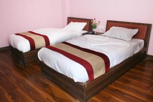 Postel nebo postele na pokoji v ubytování Sitapaila Home Stay and Apartment