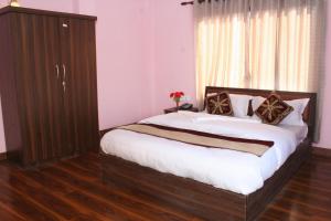 Postel nebo postele na pokoji v ubytování Sitapaila Home Stay and Apartment