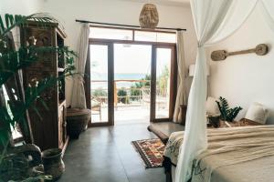 Postel nebo postele na pokoji v ubytování Dreamsea Sri Lanka