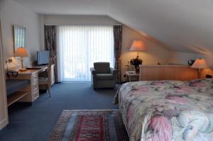 Postel nebo postele na pokoji v ubytování Hotel Anna