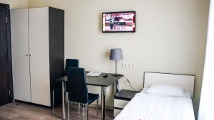 Postel nebo postele na pokoji v ubytování Bella Riga Hotel with Self-Check in