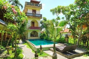 Bazén v ubytování Ubud Kerta City Hotel nebo v jeho okolí
