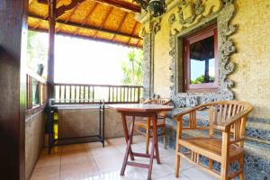 Balkón nebo terasa v ubytování Ubud Kerta City Hotel