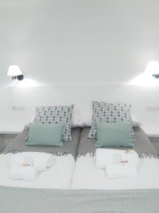 Cama ou camas em um quarto em Apartamento El Reloj