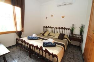Postel nebo postele na pokoji v ubytování ARENDA Villa Fortuna Miami Playa + 33 fotografií