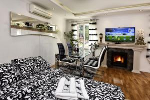 TV a/nebo společenská místnost v ubytování Apartment Markovski