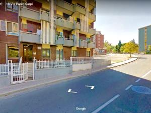 an empty street in front of a building at Bella Cagliari B&B in Cagliari