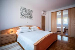 Postel nebo postele na pokoji v ubytování Villa Dream