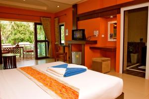 Postel nebo postele na pokoji v ubytování Simple Life Resort Koh Tao