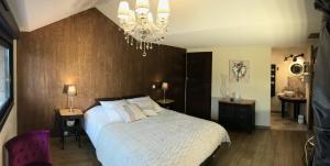Postel nebo postele na pokoji v ubytování La Chambre Enchantée