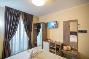 Μια τηλεόραση ή/και κέντρο ψυχαγωγίας στο B&B Dimmito