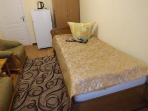 Cama o camas de una habitación en Signal Hotel DOSAAF