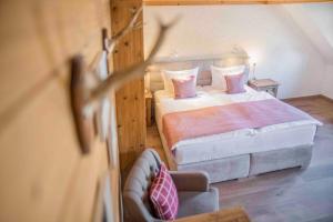 Postel nebo postele na pokoji v ubytování Kaisers Tanne - Premium Alles Inklusive Hotel