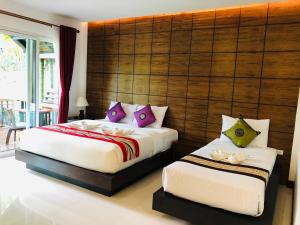 Posteľ alebo postele v izbe v ubytovaní Vipa Tropical Resort