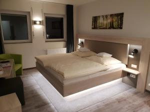 Postel nebo postele na pokoji v ubytování Hotel Clemenswerther Hof