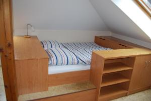 Postel nebo postele na pokoji v ubytování Apartmany U Stareho Labe