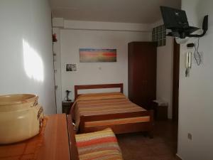 Posteľ alebo postele v izbe v ubytovaní B&B Leggieri Villa Siria