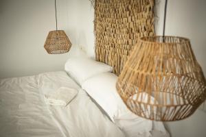 A bed or beds in a room at Boutique X Pueblo, Benalmádena Még 37 kép