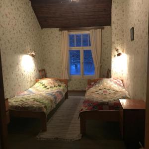 Säng eller sängar i ett rum på Annenhof Holiday House