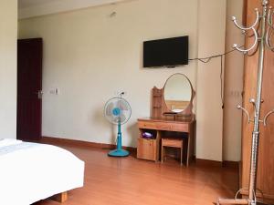 TV a/nebo společenská místnost v ubytování Van Anh Hotel