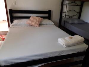 A bed or beds in a room at Finca la Miradita