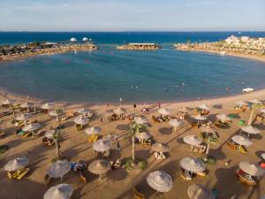 an aerial view of a beach with umbrellas and the ocean at Desert Rose in Hurghada +140 photos