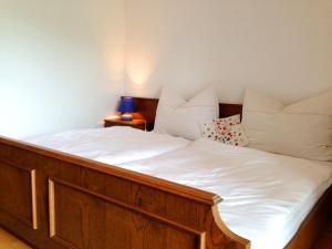Postel nebo postele na pokoji v ubytování Apartments Urschitz