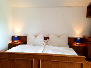 Postel nebo postele na pokoji v ubytování Apartments Urschitz