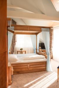 Ein Bett oder Betten in einem Zimmer der Unterkunft Hotel Toggenburgerhof