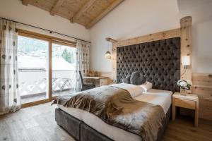 Posteľ alebo postele v izbe v ubytovaní Alpenhotel Plaza