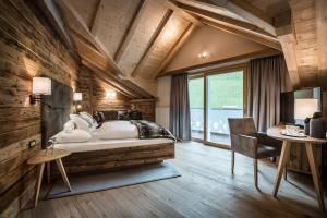 Posteľ alebo postele v izbe v ubytovaní Alpenhotel Plaza