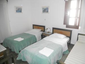 A bed or beds in a room at Villa Ostria