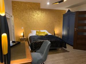 Postel nebo postele na pokoji v ubytování La Chambre Enchantée